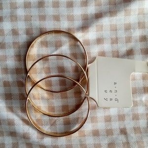 A new day, set of three gold bangles NWT